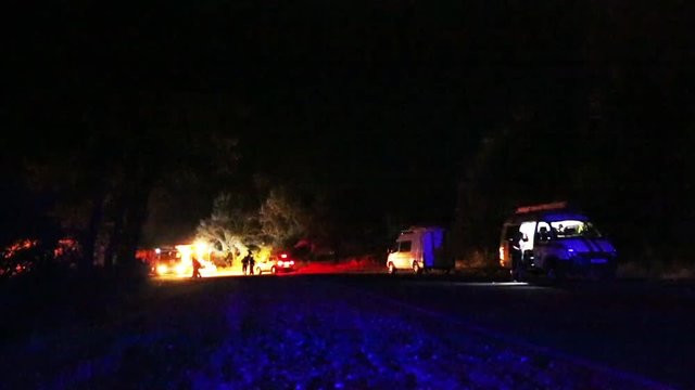 scene of emergency with ambulance and flashing lights