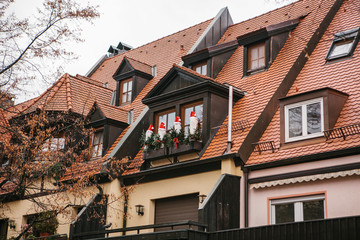 Christmas decorations on the ledge outside the window.