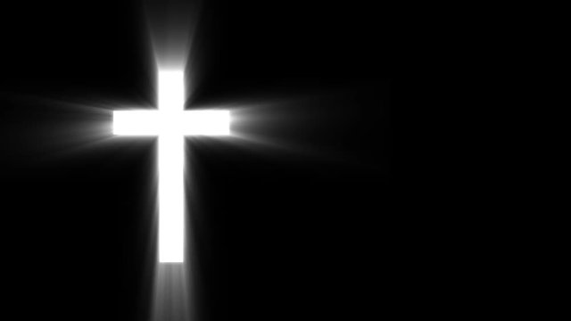 Religioush cross with sun rays  shine on the dark  background footage