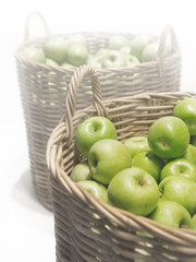 Green apples in big basket