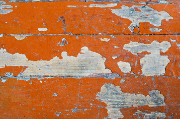 Texture of old dilapidated wooden floor with brown peeling paint. Exfoliated Paint on an Old Wooden Floor. Shabby Background