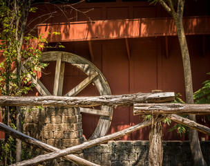 Wheel Against Barn