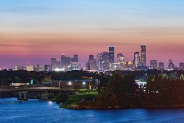 Fototapeta na wymiar Red sunset over Houston, Texas. View from city docks