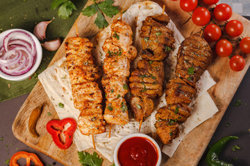 Roasted meat skewer with spices and vegetables