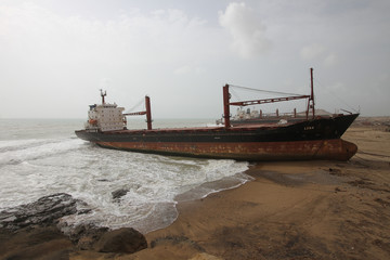 Huge cargo ship run ashore in ship breaking yard