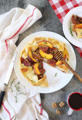 Homemade figs, nectarine and pears tart galette with honey