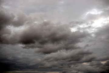Obraz premium Dark ominous grey storm clouds.