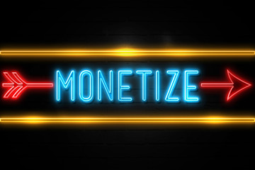 Monetize  - fluorescent Neon Sign on brickwall Front view