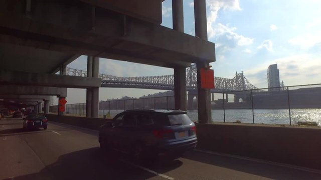alt day driving on FDR POV shot of Queensboro Bridge