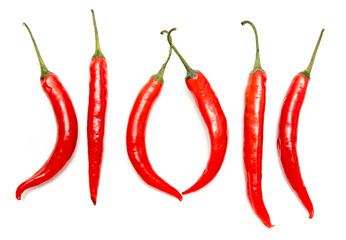 Red chile pepper bitter on white background