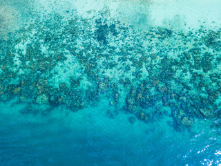 Aerial view or top view of tropical island beach with clear water Coral Island, Koh Hey, Phuket
