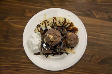 chocolate Toast. Bread buttered toast. Topped with chocolate, bananace ,cream and whipped creamream, ice cream. High-calorie food. Dessert girls love.