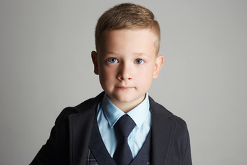 little boy in a three-piece suit