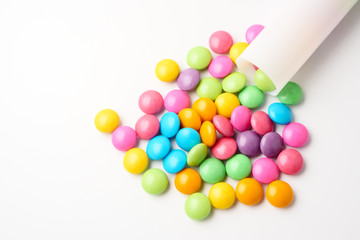 Colorful candies on a white background.