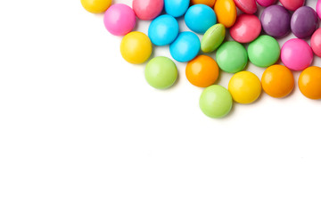 Colorful candies on a white background, Free space for text.