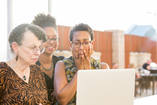 Closeup Portrait, Multigenerational Family Looking At Something Horrible On Laptop, Isolated Outdoors Background