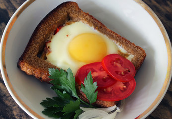 fried eggs in bread.Breakfast