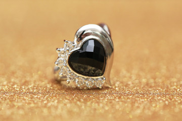 diamond ring and black gemstone
