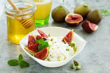 useful breakfast, cottage cheese with figs and honey.