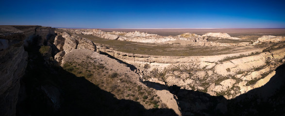 Panorama view to Aral sea from the rim of Plateau Ustyurt at sunset in Karakalpakstan, Uzbekistan
