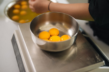 Bakery chef cooking bake in the kitchen professional