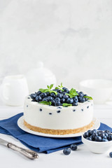 no baked cheesecake with fresh blueberry on white  background