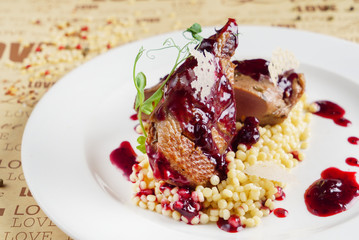 duck with cranberry sauce and couscous