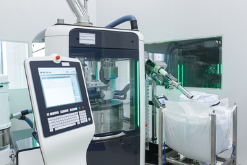 The room in the production laboratory with an electronic device for the manufacture and packaging...