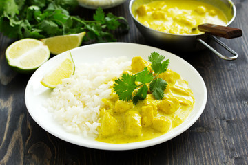 Yellow curry with chicken and rice. Asian cuisine.