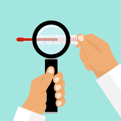 The doctor is holding a thermometer