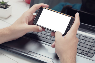 Smartphone in male hands