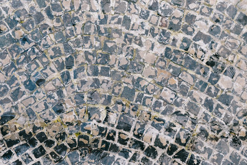 Stone texture under the water near the fountain