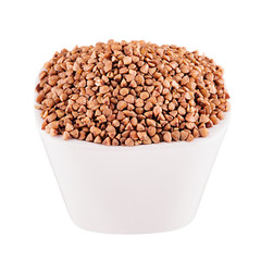 Buckwheat in white bowl, close up, isolated. Template for menu, cover, advertising.
