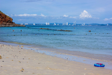 blue Life ring on the beach with sea and sky background