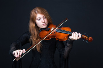 Medieval redhead violin player