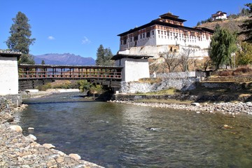 Paro Rinpung Dzong, The traditional Bhutan palace with wooden bridge across the river  Paro Chu near to the city Paro, BHUTAN