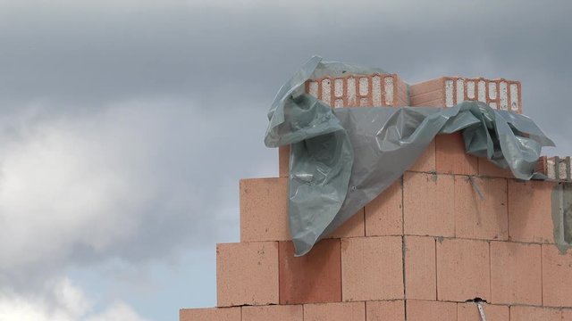 brickwork covered with foil 