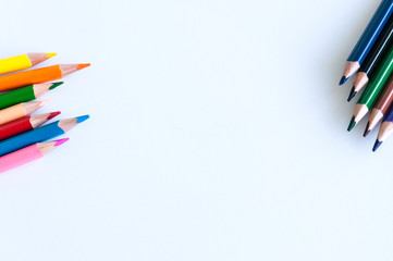 Group of colorful pencils on a white background. Close up and copy space.