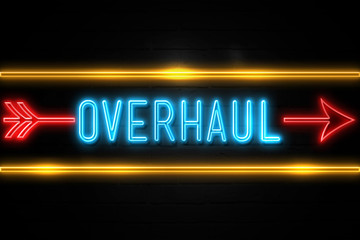 Overhaul  - fluorescent Neon Sign on brickwall Front view