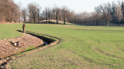 Landscape among the hills awaiting spring