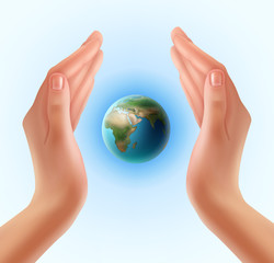 Hands with planet