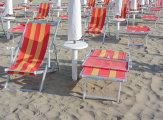 beach chair on empty beach in the early morning