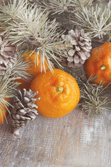 Christmas balls with fir branches and glasses of champagne