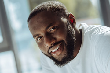 Portrait of cheerful afro american man