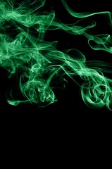 Abstract green smoke on black background, smoke background,green ink background,green, beautiful color smoke
