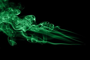 Abstract green smoke on black background, smoke background,green ink background,green, beautiful color smoke
