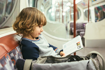 Child traveling by subway