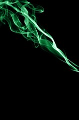 Abstract green smoke on black background, smoke background,green ink background,green, beautiful color smoke