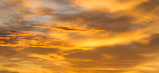Dramatic sunrise sky with clouds.Blur or Defocus image.