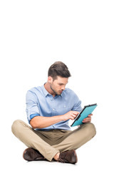 young man using tablet